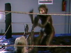 Bombshells wrestling in the muddy ring