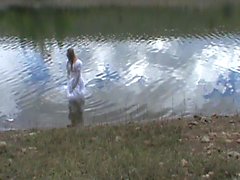 big wedding gown in a lake