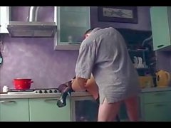 Sexy babe fisted and fucked in the kitchen
