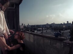 Redhead has her morning coffee and sex on the balcony