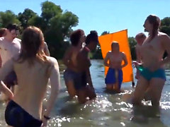 Interracial Nudists Playing Games In River Voyeur