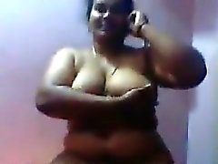 Big Indian Woman Doing A Striptease