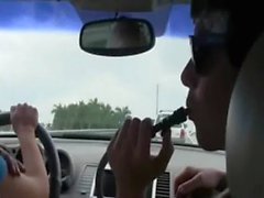 Horny babes sucking penis in car