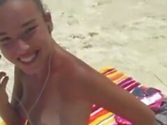 she is a sweet teen at the beach having fun