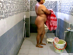 Chubby Indian Bhabhi taking bathroom after rough sex